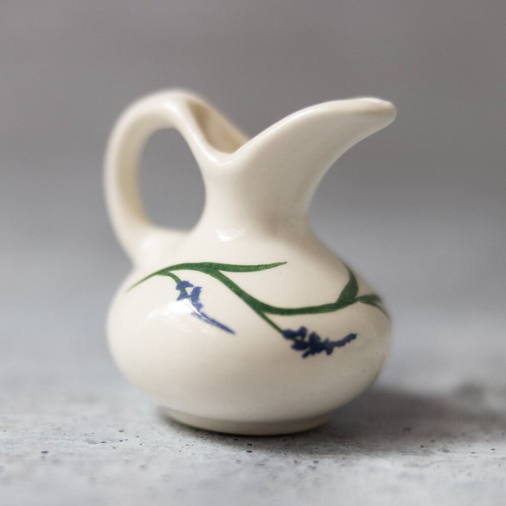 Painted lavender blue white pottery ceramic creamer signed SD 2 inches tall